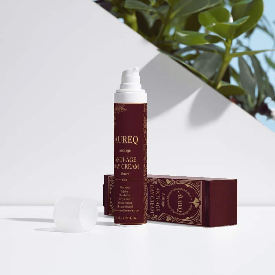 AUREQ Anti-Age Day Cream packaging and dispenser on a minimalistic background, showcasing skincare.  
