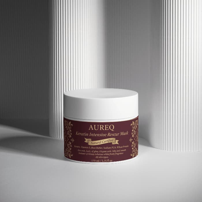 AUREQ Keratin Intensive Rescue Hair Mask in a sleek container, designed for restoring damaged hair.