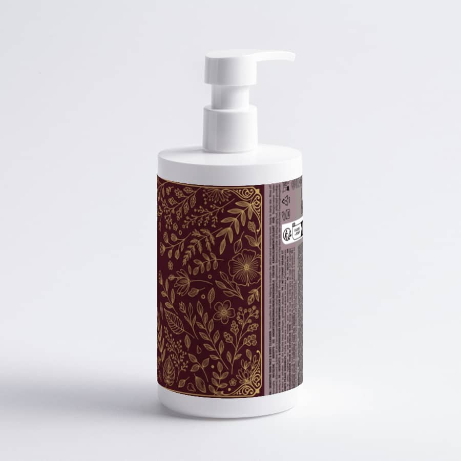 Sensitive Skin Face & Body Cleanser in a pump bottle with floral design, suitable for delicate skin care.